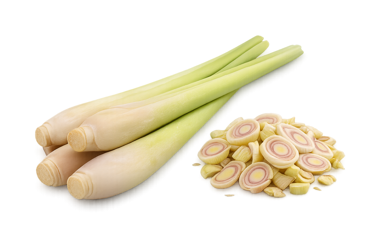 Fresh lemongrass stalks and cut green leaf blades on a pale surface
